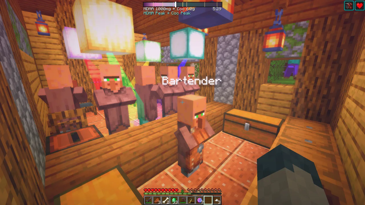 Villagers gathering and dancing inside a village nightclub at night